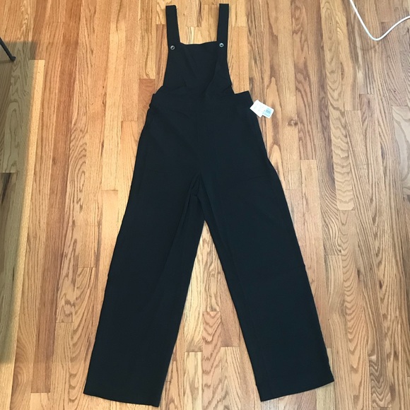 black fabric overalls